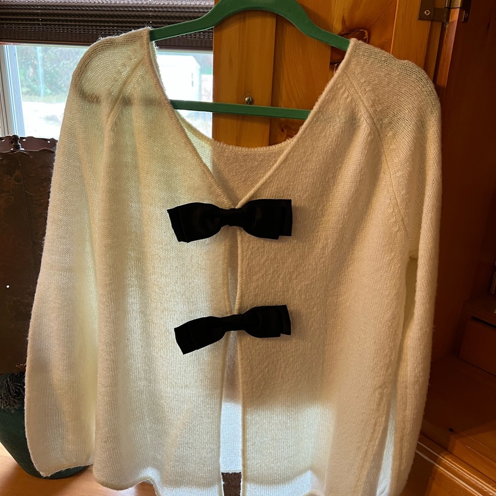 White and black sweater